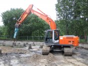 Hitachi ZX210LC-3 met MSB MS550S